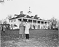 Photograph of the Shah of Iran outside George Washington's home, during his tour of Mount Vernon., ca. 11/16/1949 - ARC Identifier: 200147.