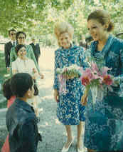 Children greet First Lady Patricia Nixon and the Shahbanou of Iran, 05/31/1972
