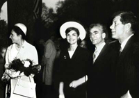 President and Mrs. Kennedy pose with the Shah and the Shahbanou of Iran.